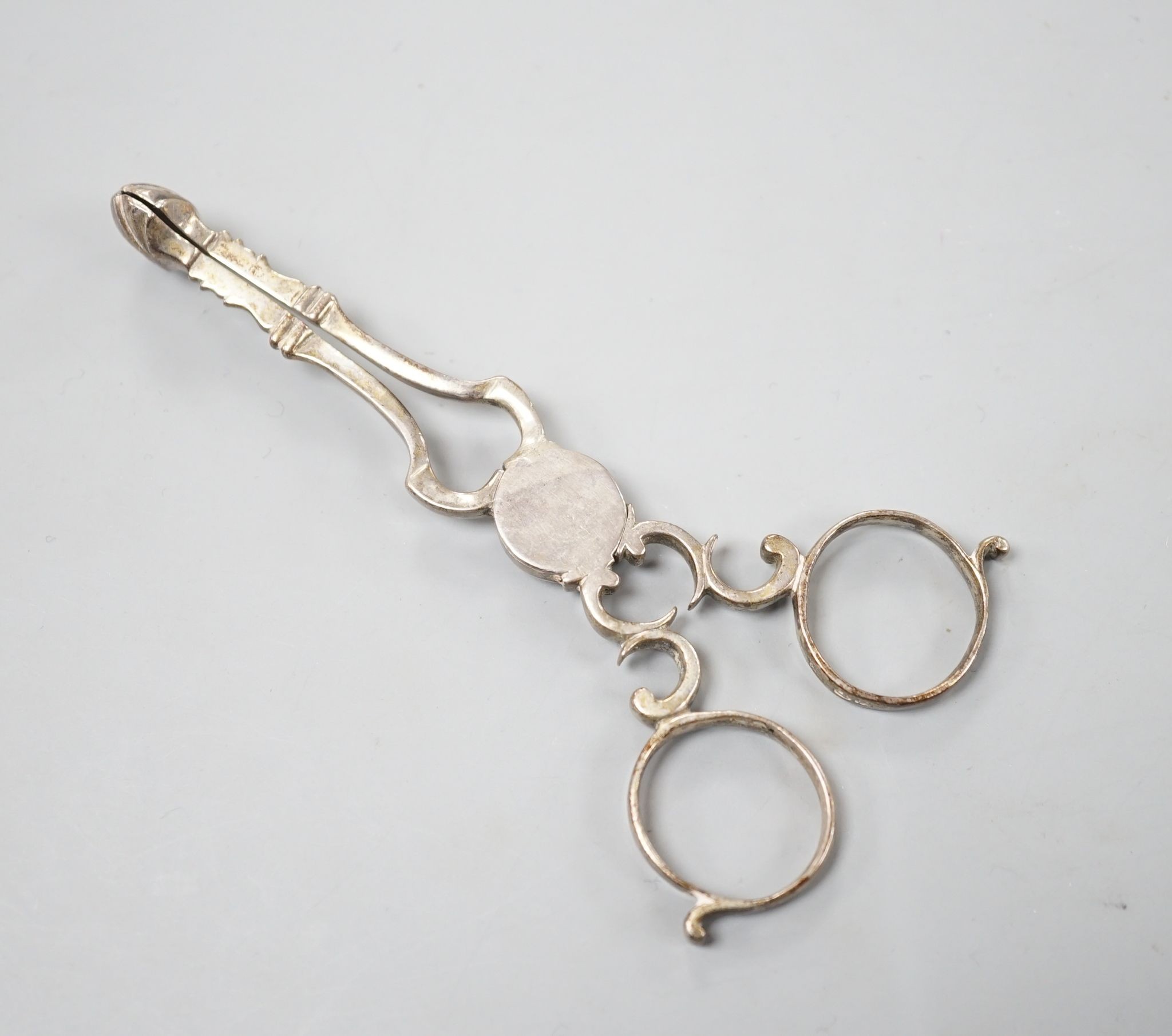 A pair of mid 18th century silver sugar nips, maker, possibly Henry Plimpton, 12cm.